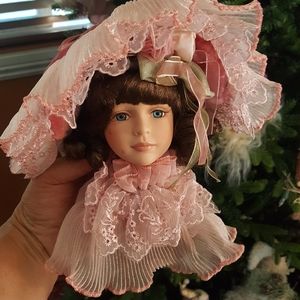 Christmas porcelain face doll ornament